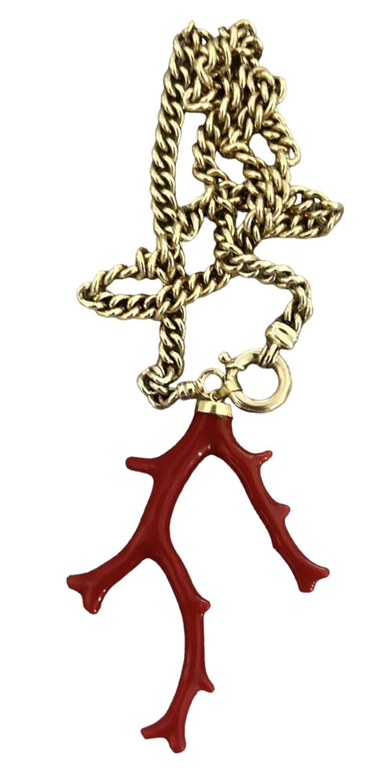 Very large polished Coral branch in a 18 crt gold setting