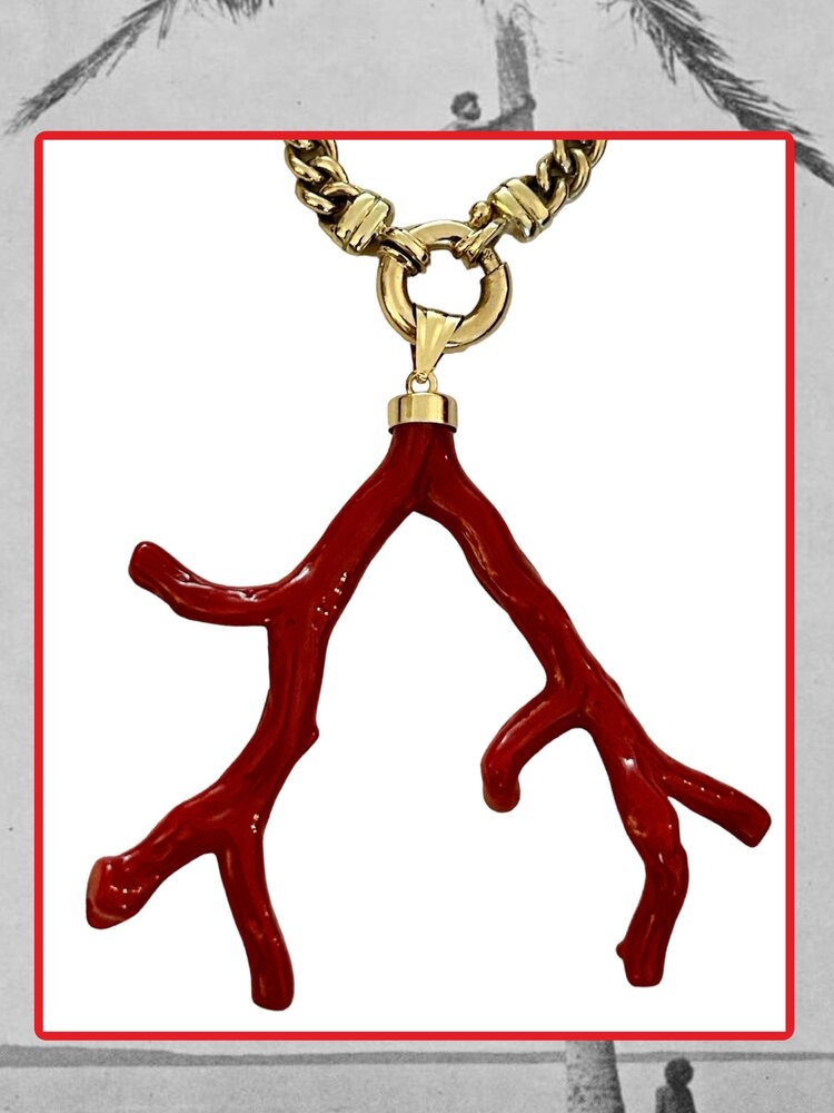 Very large polished Coral branch in a 18 crt gold setting