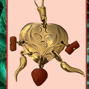 Carved handcasted heart with coral  and14 crt gold details and lock 14