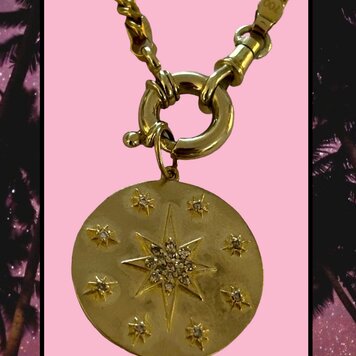 Large polished diamond starburst token 14 crt gold Large polished diamond starburst token 14 crt gold