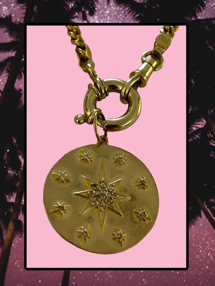 Large polished diamond starburst token 14 crt gold