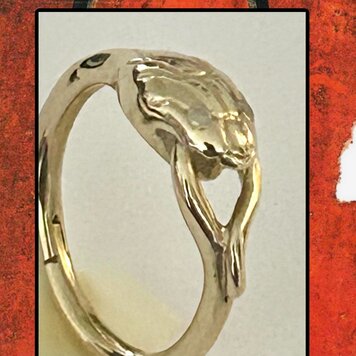 Snake charmholder 14 crt diamond eyes