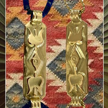 Massive 14 crt rectangular amulet