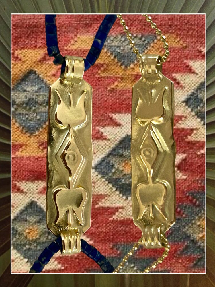 Massive 14 crt rectangular amulet