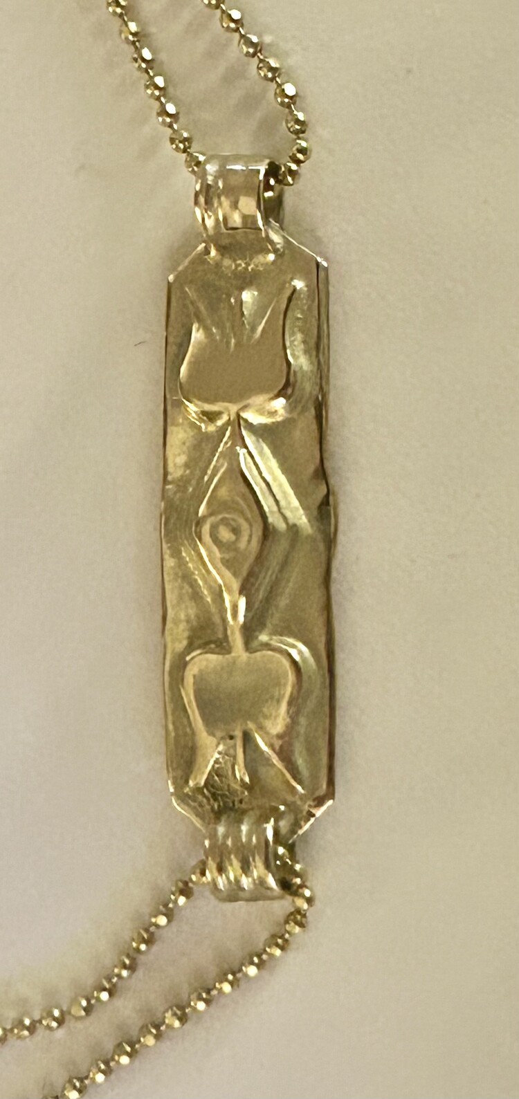 Massive 14 crt rectangular amulet