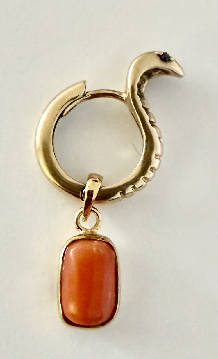 Natural antique Coral in 14 crt setting