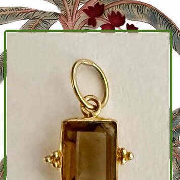 Rectangular smoke quartz 14 crt gold charm