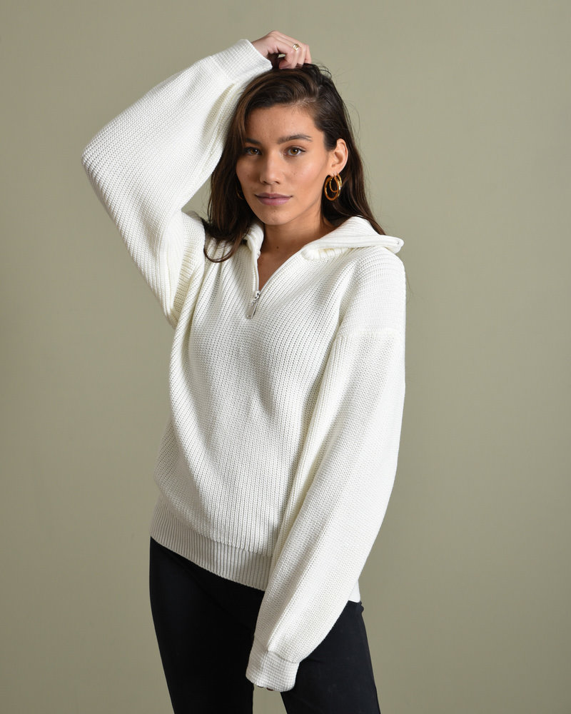 white zip up sweater