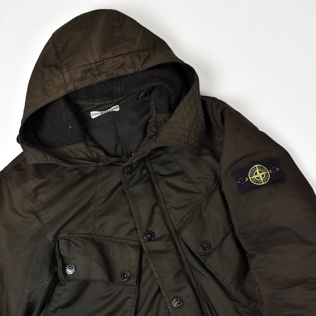 stone island's thermal-reactive ice jacket slowly changes its color from  hot pink to cold white