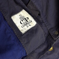 C.P. Company blue garment dyed cotton poly belted mille miglia goggle jacket 54