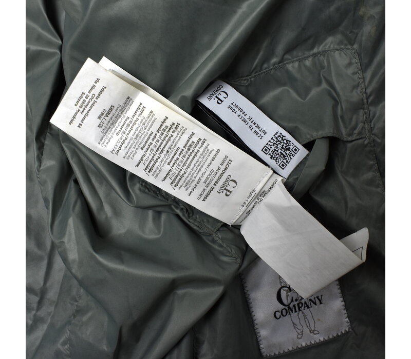 C.P. Company green dd shell nylon down lens detail jacket 48
