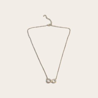 Collier en acier inoxydable avec signe infini et oxydes de zirconium.