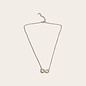 Collier en acier inoxydable avec signe infini et oxydes de zirconium.