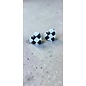 Handcrafted clay earrings with a black and white checkerboard pattern and butterfly backs.