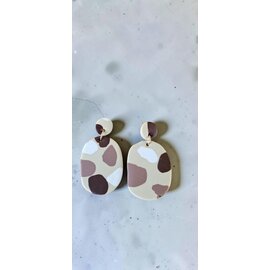 Handcrafted clay earrings with a terrazzo pattern.