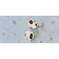 Handcrafted clay earrings with a terrazzo pattern.