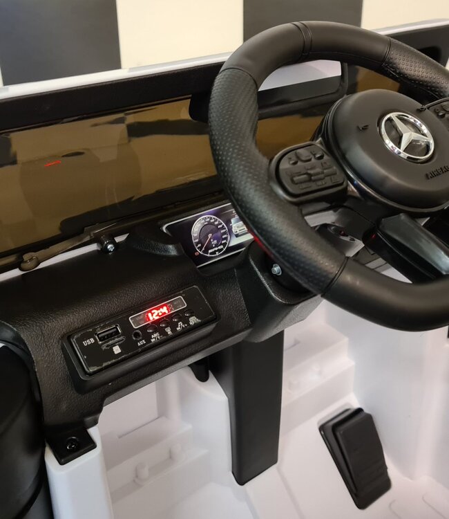 Mercedes G63 kinderauto 12V wit met zachte start voor 1 persoon