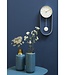 Wandklok slinger charme