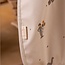 Nuuroo Ida Coated Bib with Pocket - Music Dino