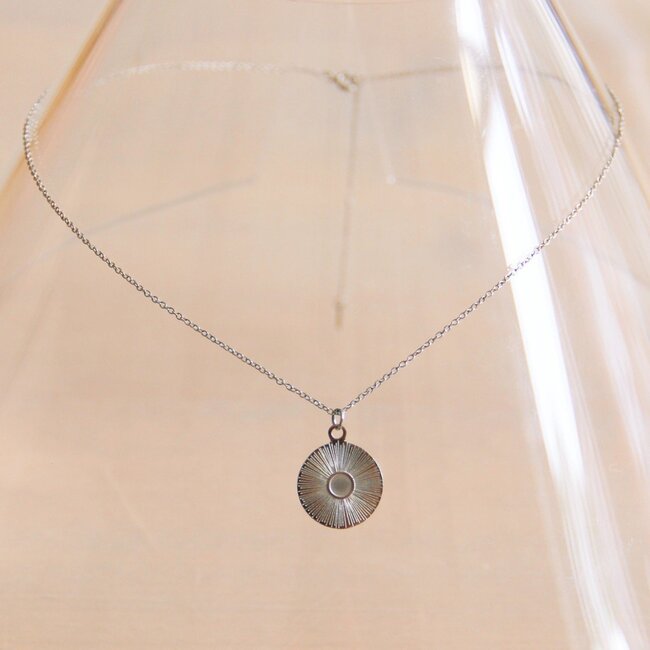 Stainless steel fine necklace with round fantasy charm - silver