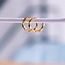 RVS ring 14mm "gedraaid" - goud