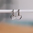 CB337: RVS creolen met fantasie hartje - zilver