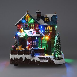 Reindeer Lodge Weihnachtshaus mit Weihnachtsmusik und
