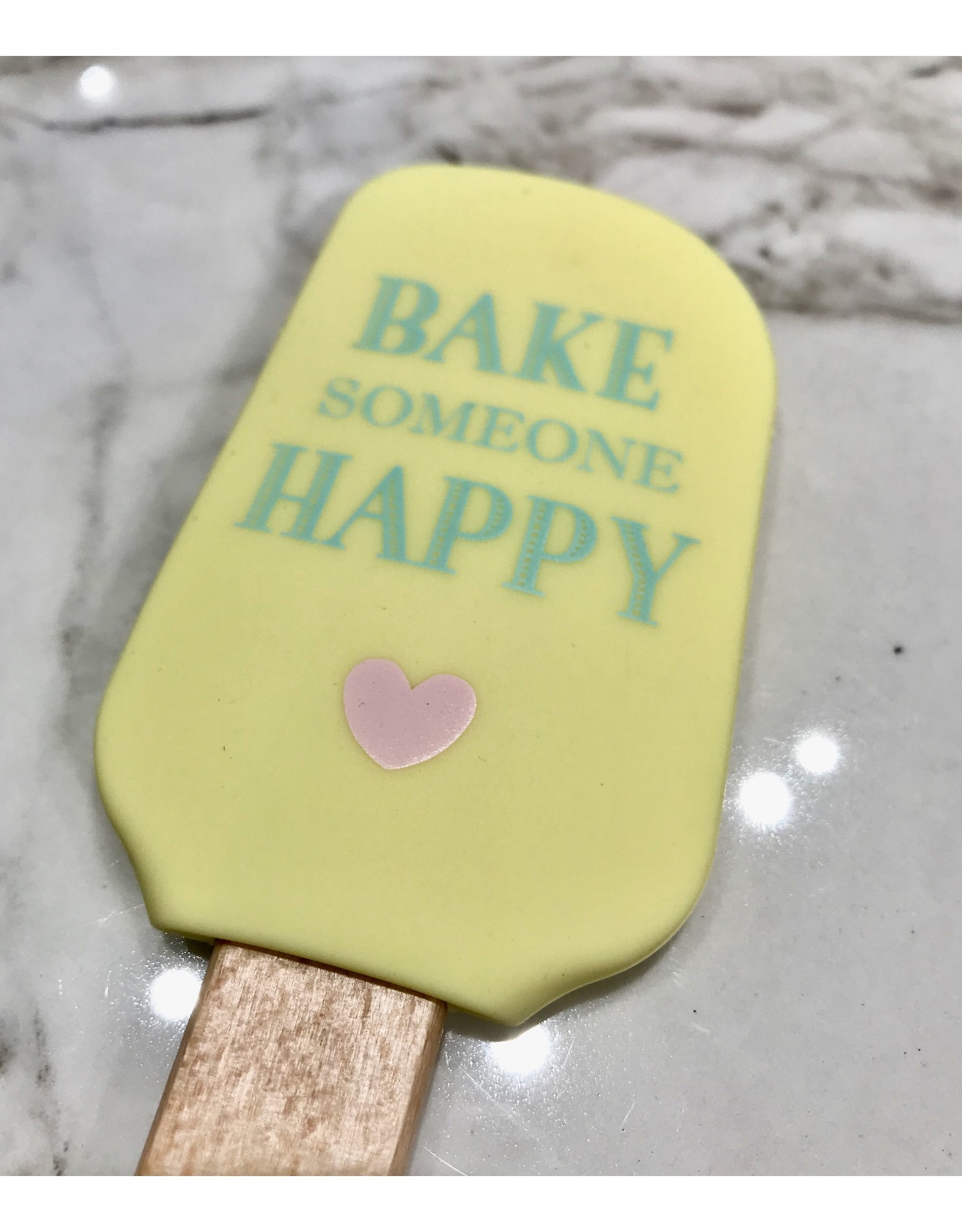 Spatel geel "Bake someone happy"