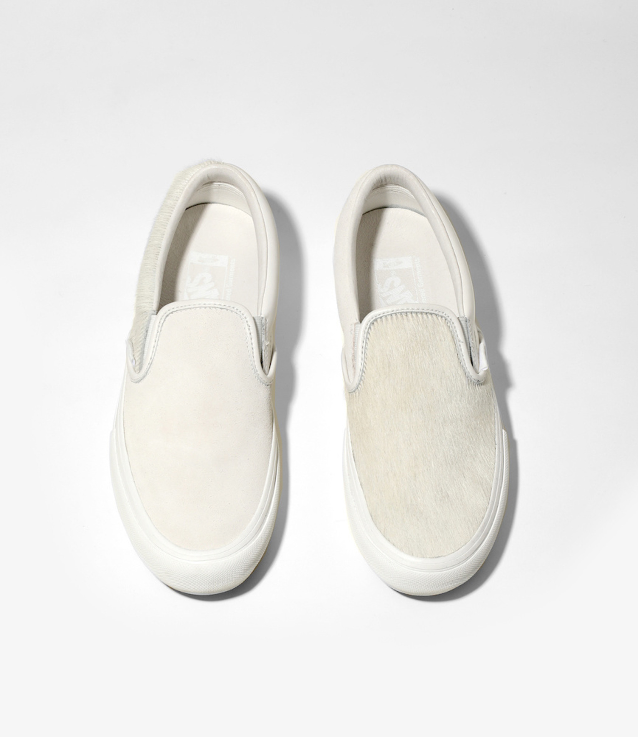 vans vault white slip on