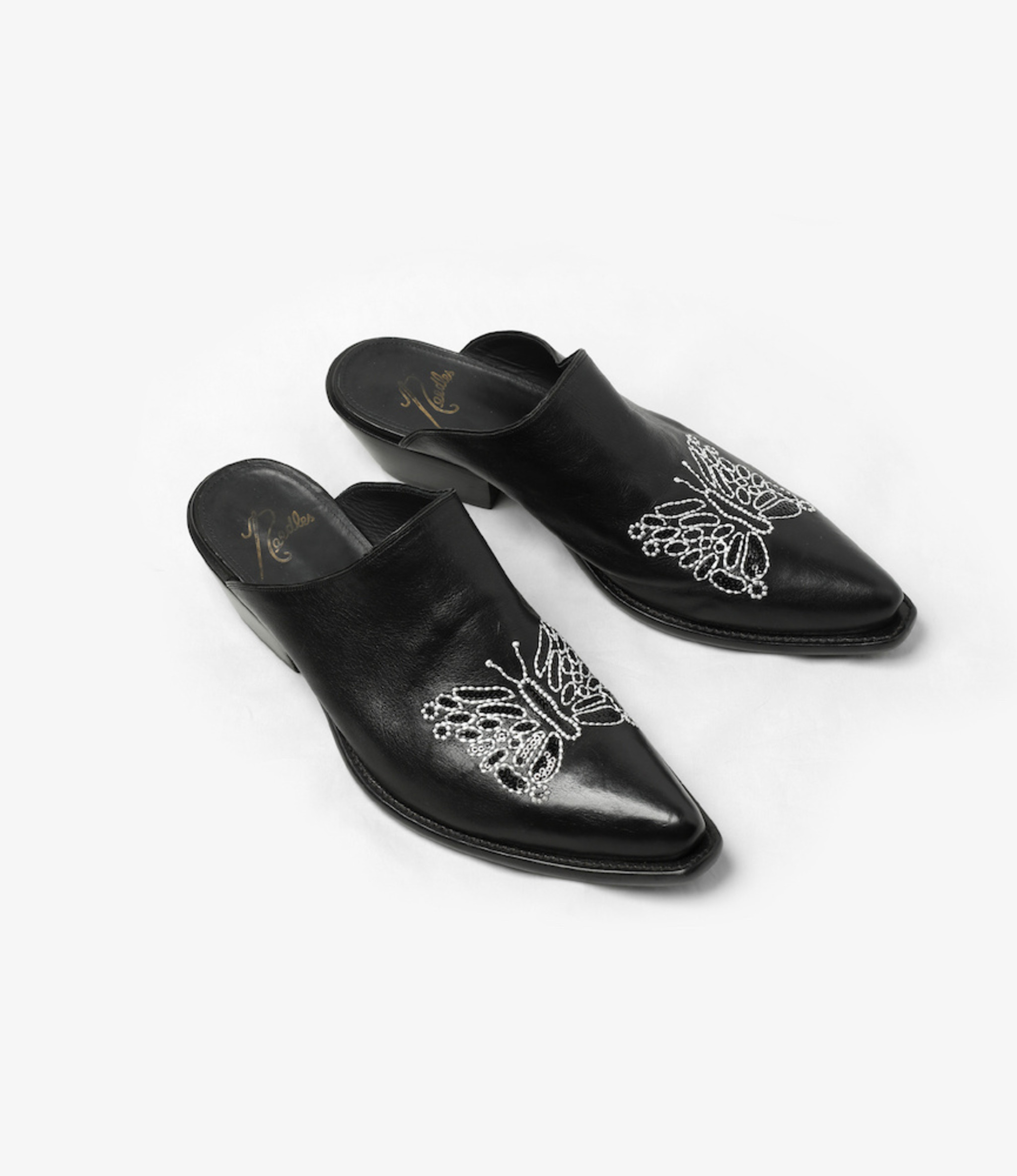 heeled mules black