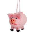 Hand knitted ball-puppet pig