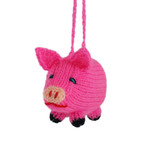 Hand knitted ball-puppet pig