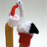 Finger puppet, stork with baby