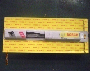 Wiper blade with arm