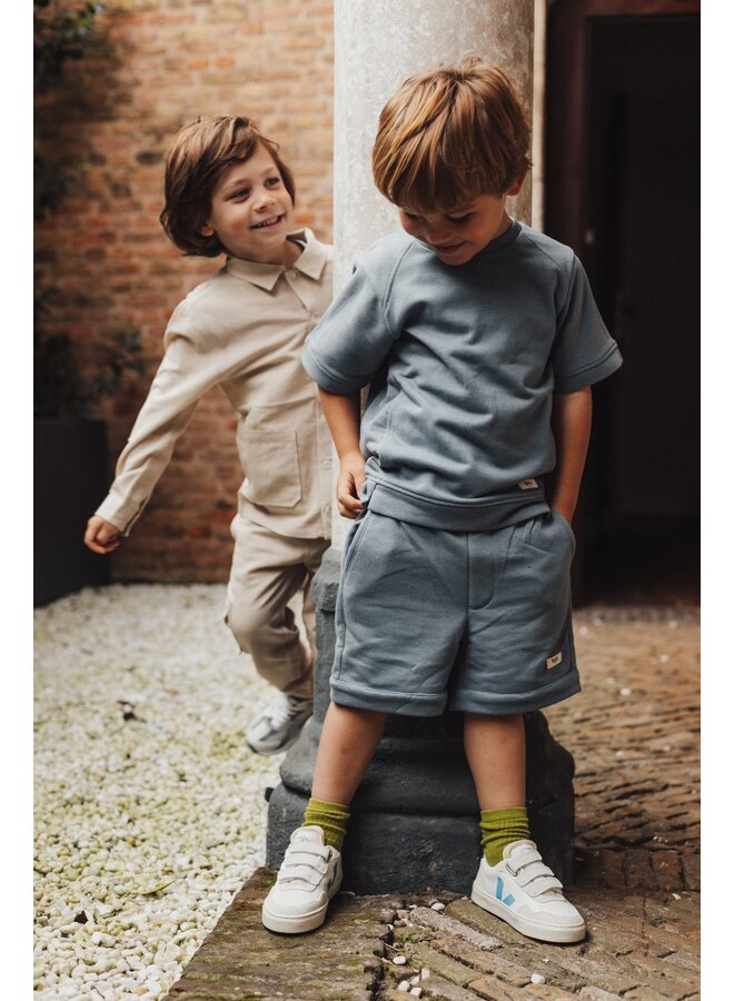 Leslie x Baje Studio - Mylo shortsleeve - Blue stone