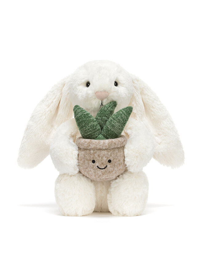 Cream bunny with plant