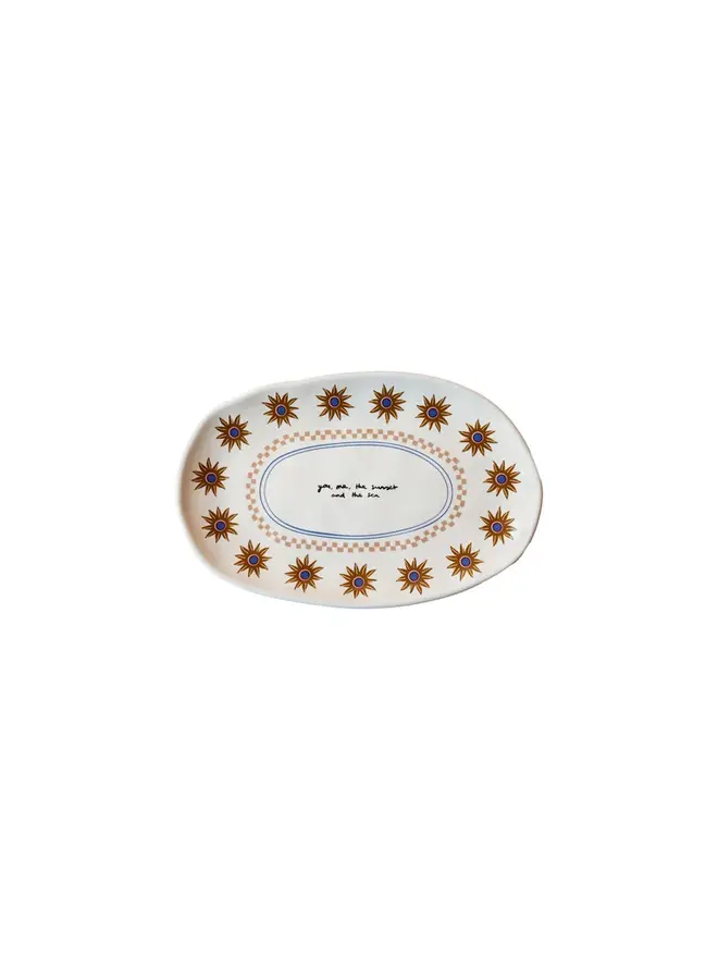 Oval plate the sunset and the sea