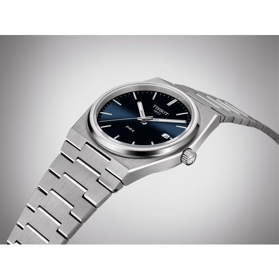 Tissot TISSOT PRX T137.410.11.041.00 | 40mm staal/staal, quartz, blauwe wijzerplaat, datum, 10ATM