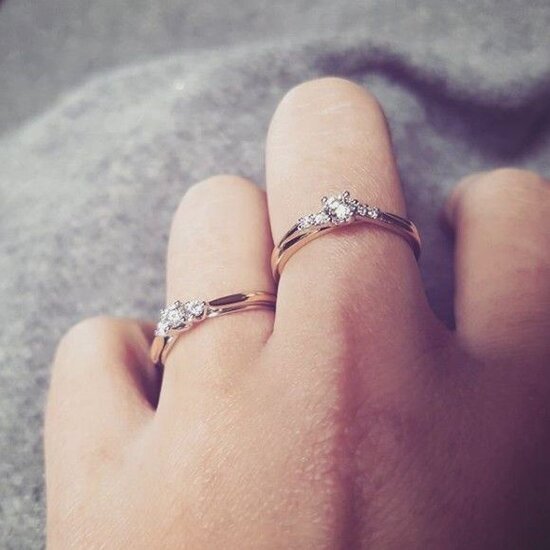 Collectie Milikan HUISCOLLECTIE 14krt bicolor ring met diamant, tot. 0.22ct H/SI 1057602