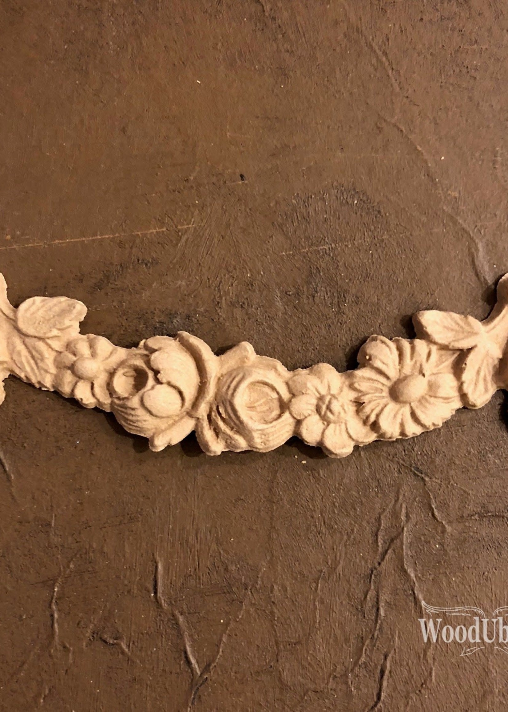 Woodubend No. 1047  Draped floral scroll 13 x 4.1cm