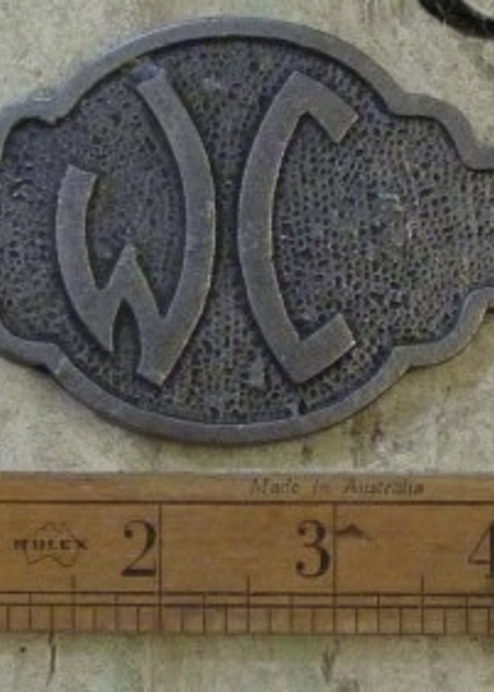 WC metal sign