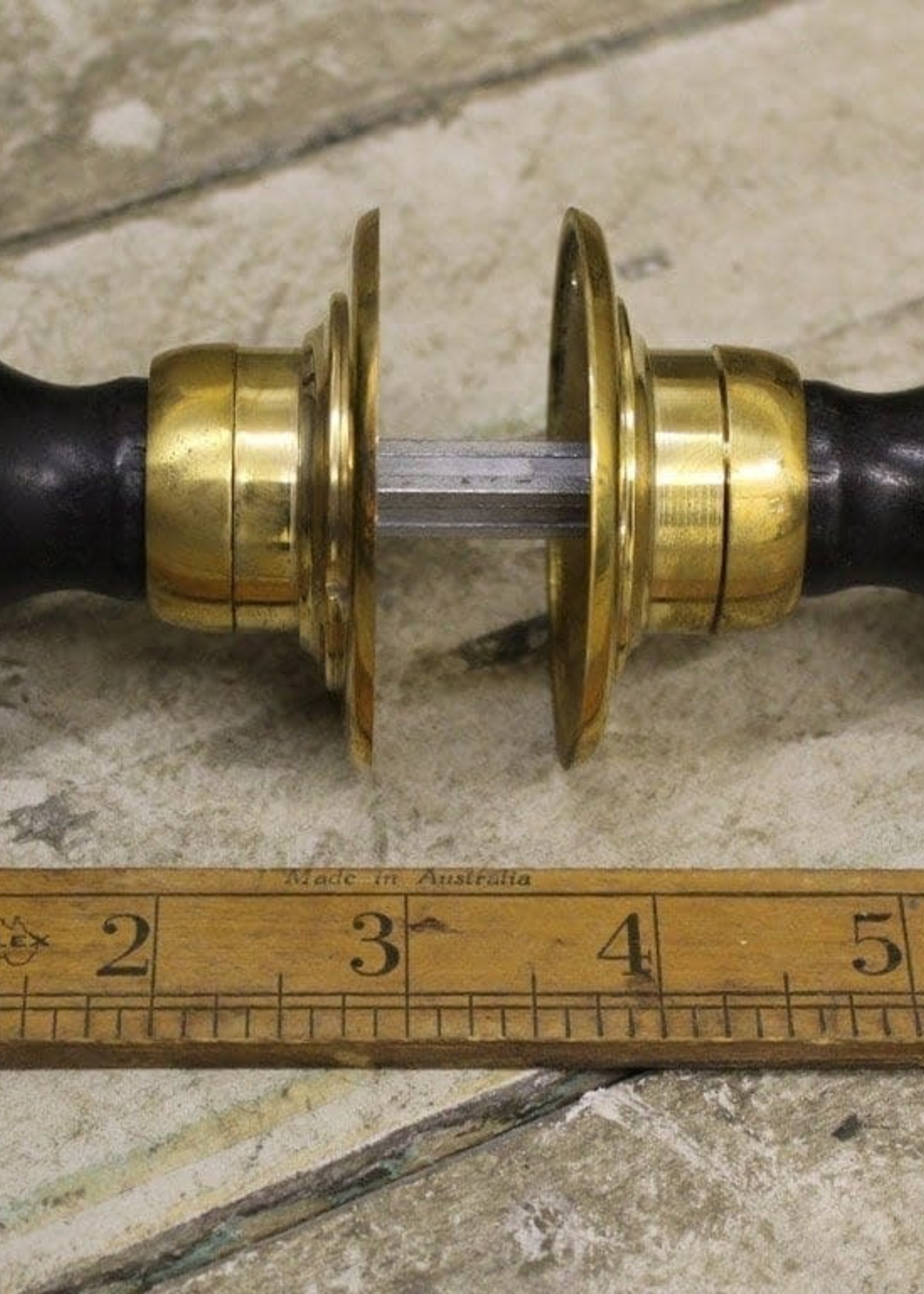 Door knob set Flat end ebony / brass 2”