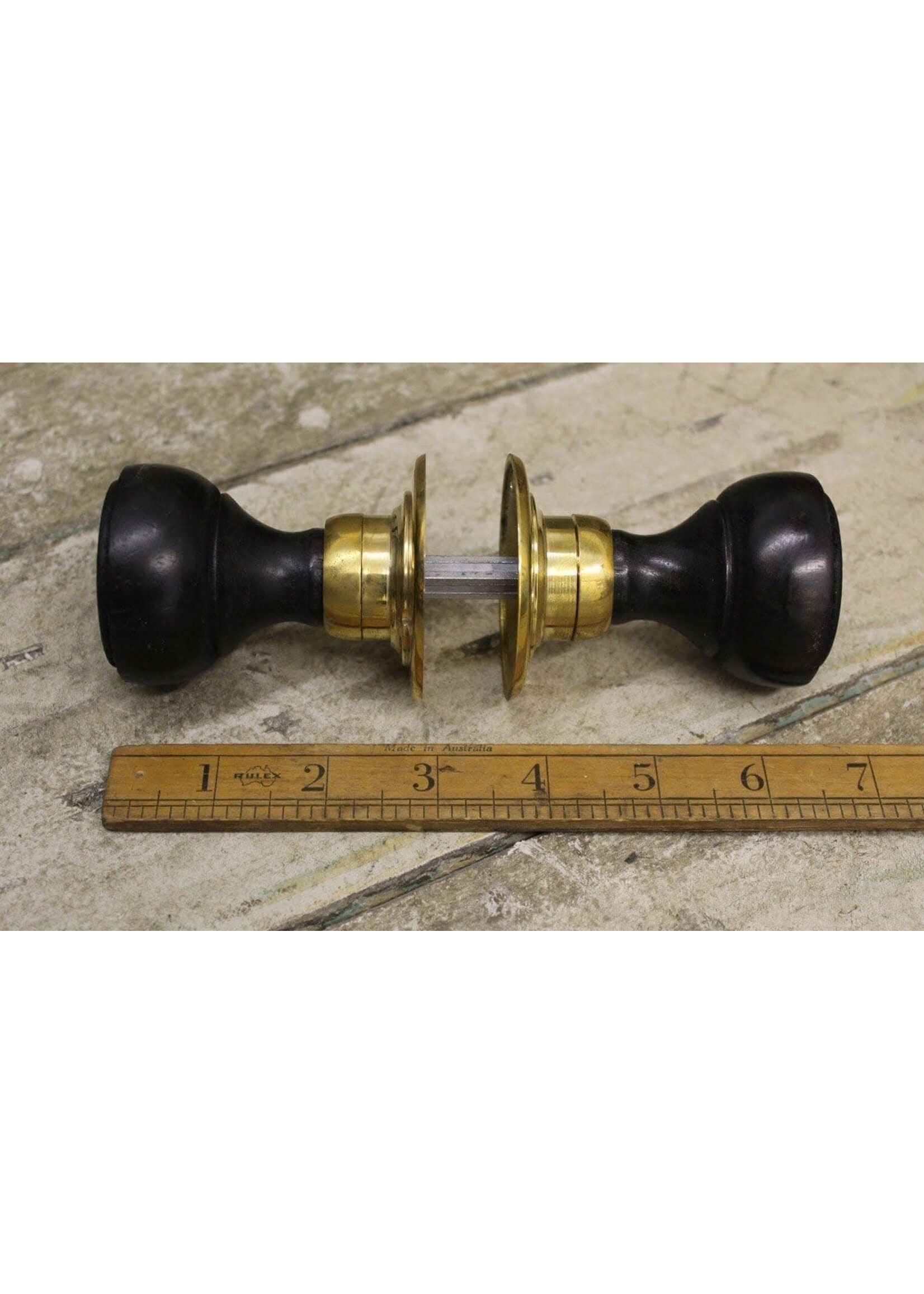 Cottingham Collection Door knob set Flat end ebony / brass 2”