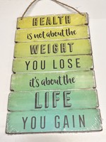 Health is not about the weight you lose it’s about the life you gain  - sign