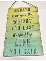 Health is not about the weight you lose it’s about the life you gain  - sign