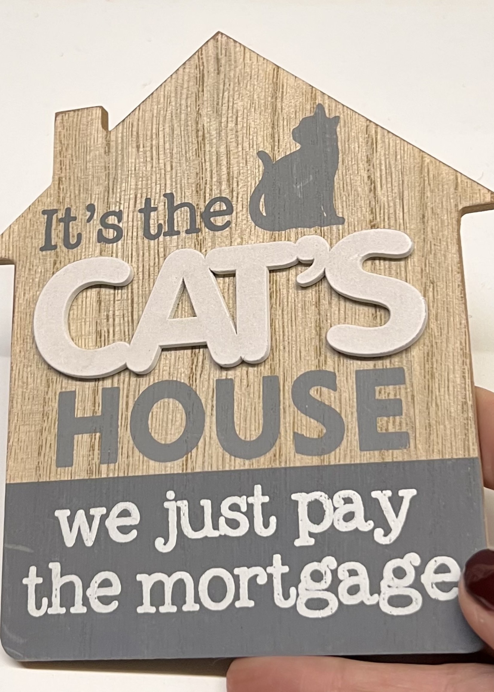 It’s the Cat’s House we just pay the mortgage  - sign