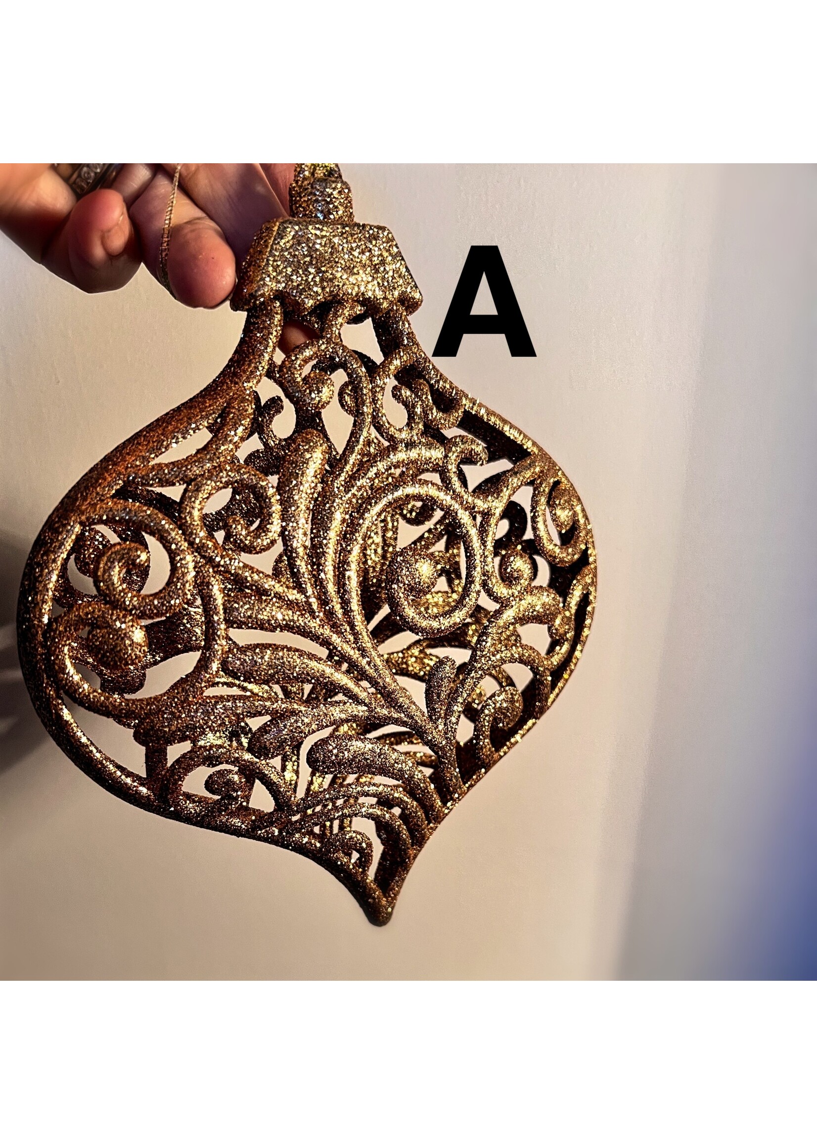 Coppery Glittery Baubles 19-23 cm in 3 assorted designs.