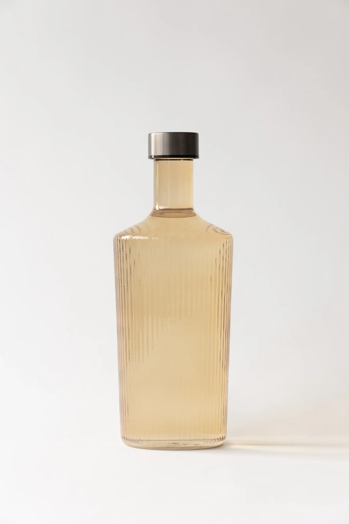 PAVEAU PAVEAU RIBBED BOTTLE 1.25L BELLS (PERZIK)