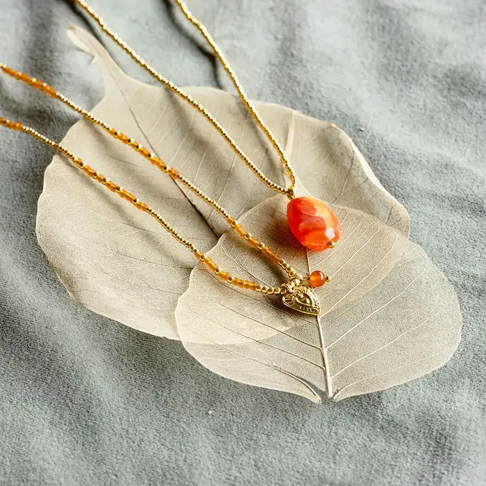 A BEAUTIFUL STORY BS HONORED CARNELIAN NECKLACE