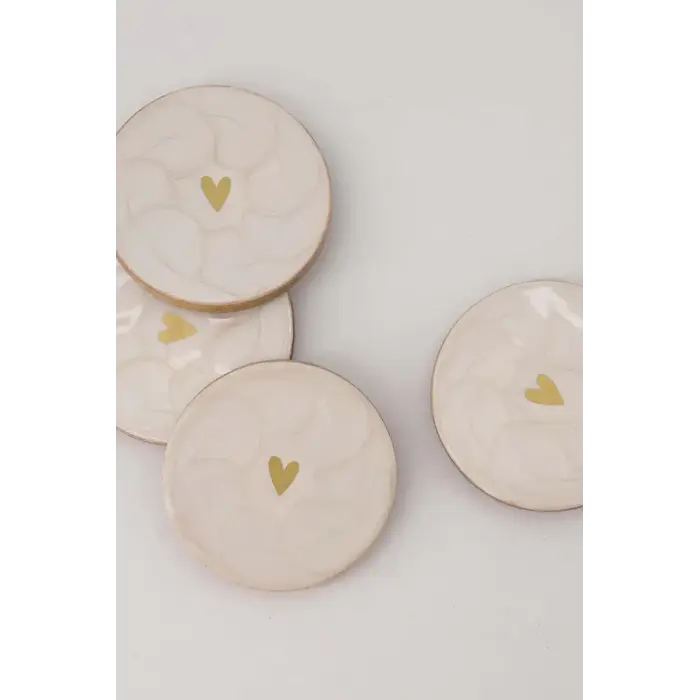 ZUSSS ZUSSS SET VAN 4 ONDERZETTERS PARELMOER HARTJE WIT / GOUD